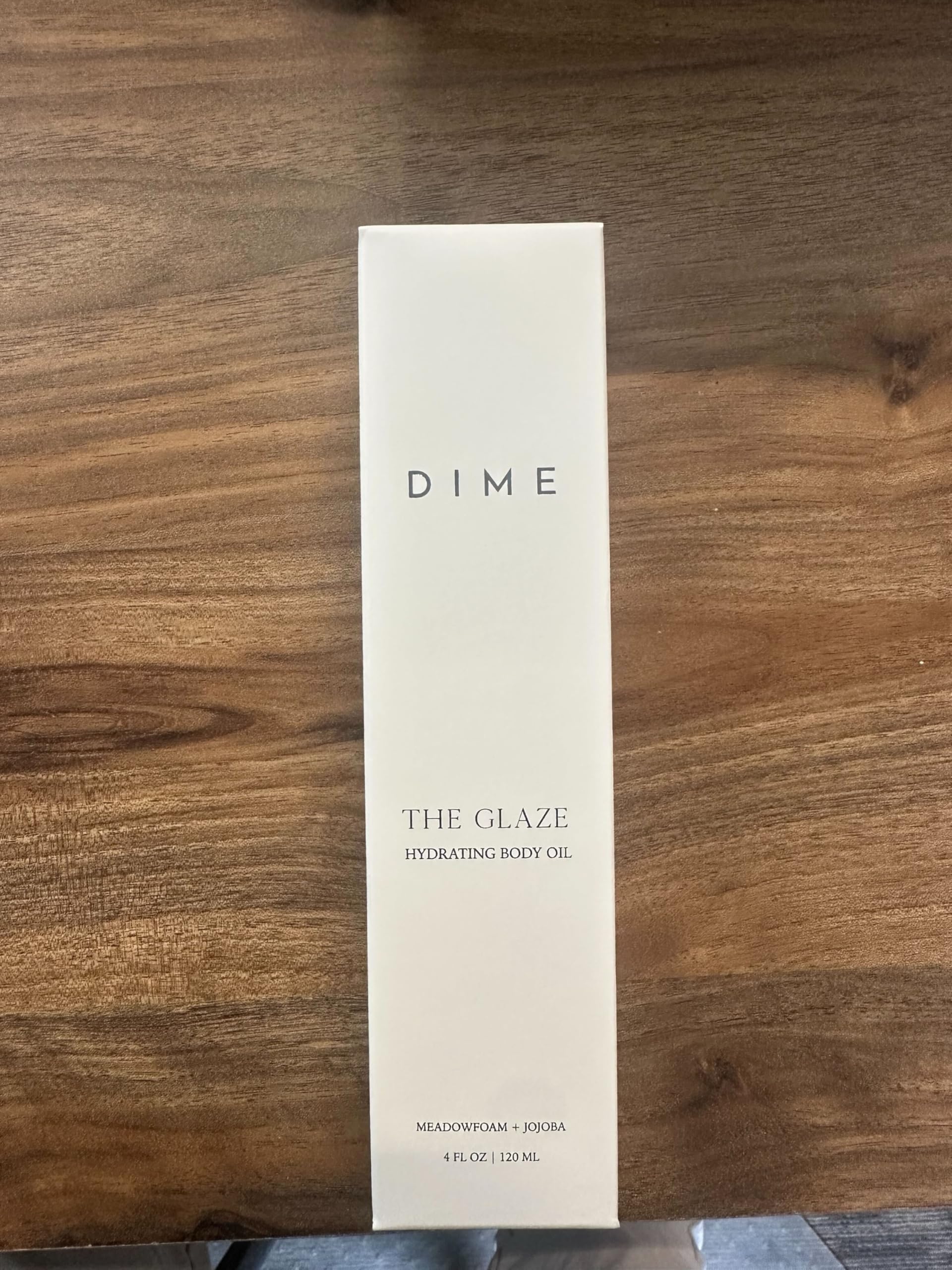 DIME Beauty Glaze Body Oil after-shower-use adds a subtle glow.