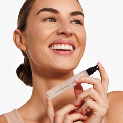 DIME Beauty I Love Your Smell, Baby spray-action shot for quick scent.
