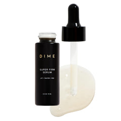 DIME Beauty Super Firm Serum bottle closeup highlighting premium packaging for daily anti-aging use.