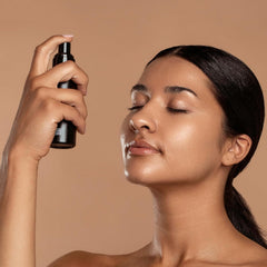 DIME Thirsty Face Mist spritz shown for quick hydration during the day.