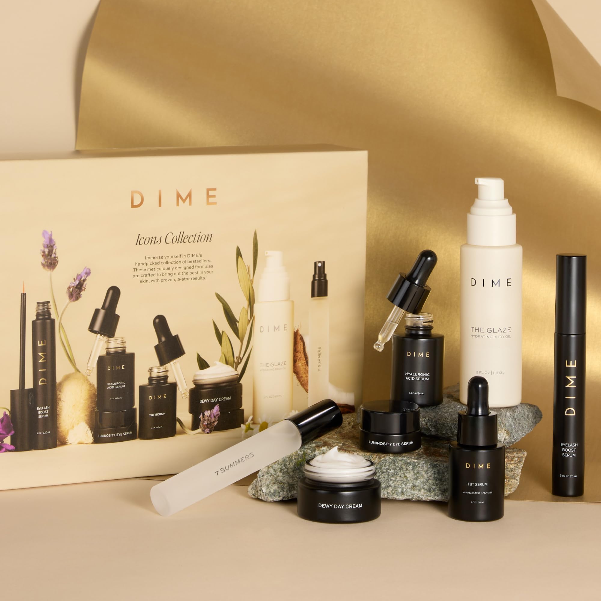 DIME Glaze Body Oil seals moisture for radiant skin.