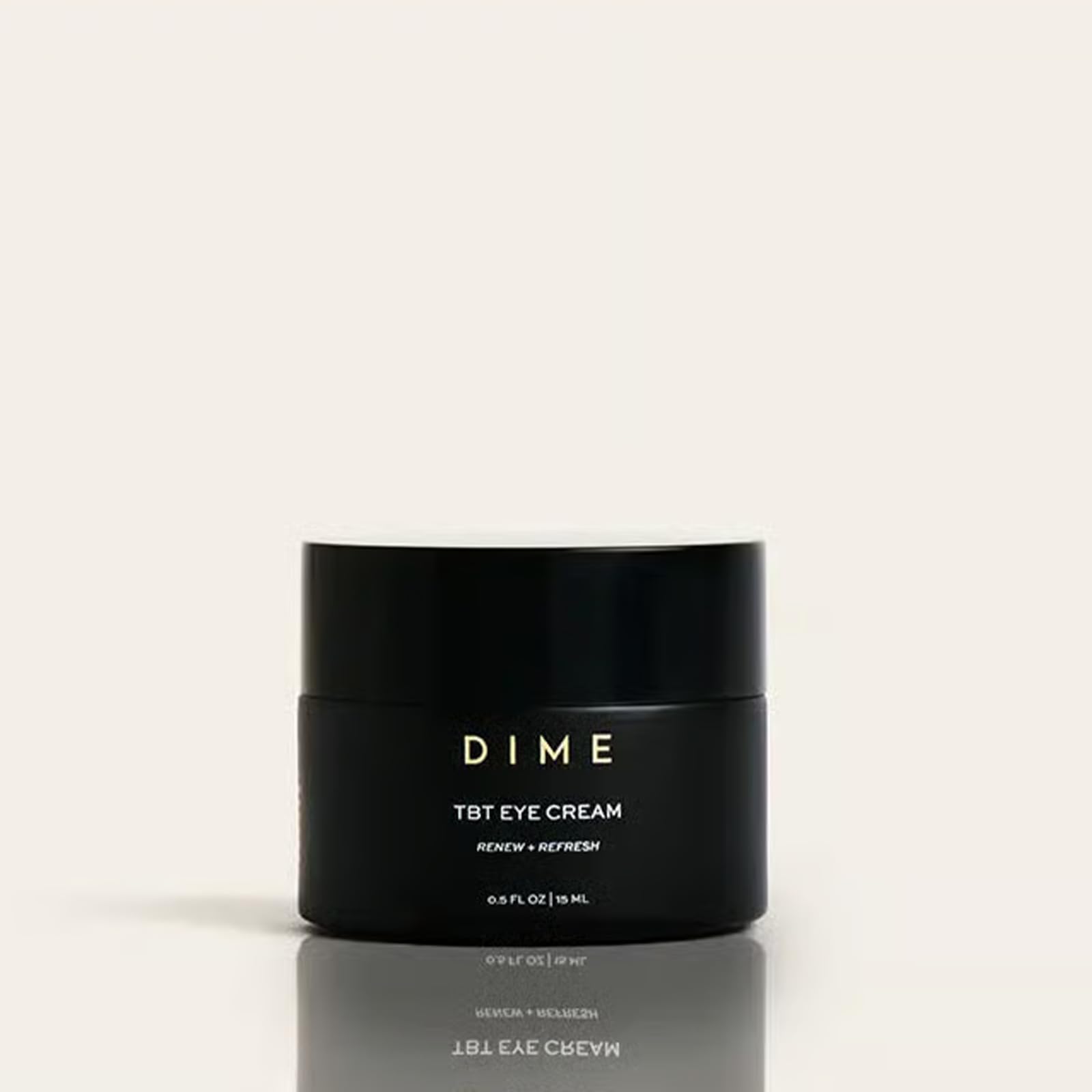 DIME TBT Eye Cream travel-size jar fits skincare on the go.