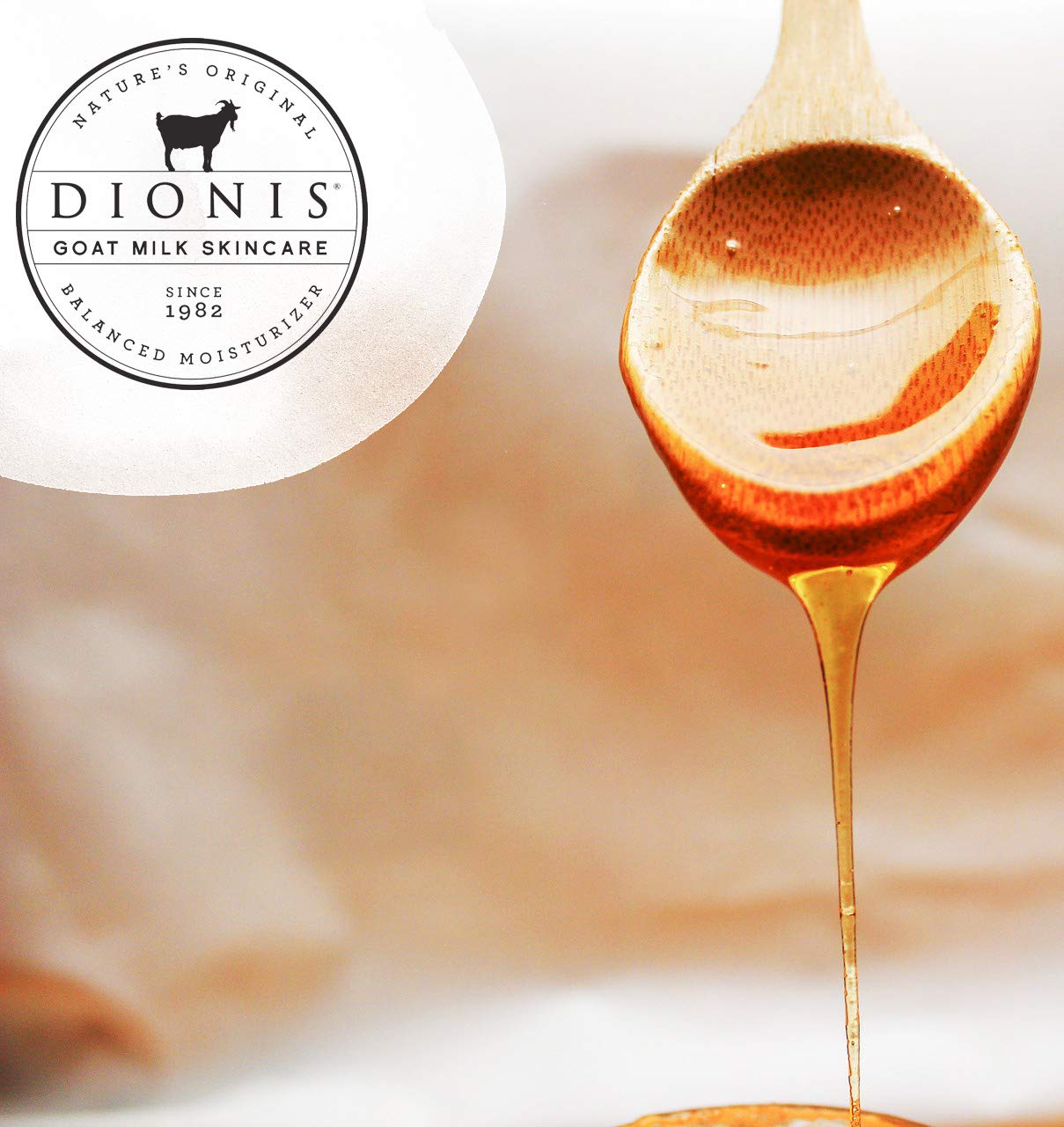 Dionis Goat Milk Lip Balm Milk and Honey tube close-up emphasizes smooth hydration