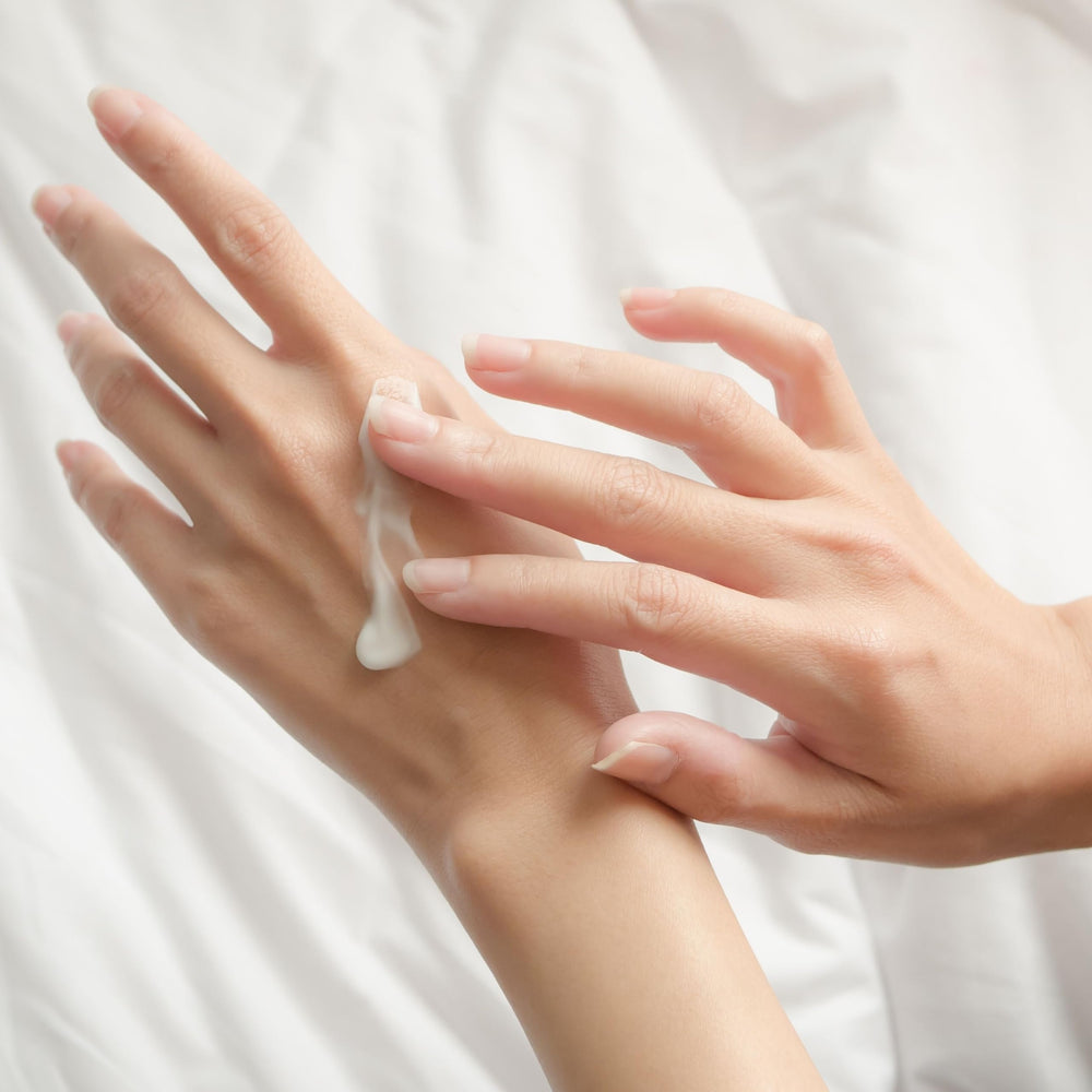 Dionis travel-size hand cream tube shown for convenient on-the-go moisture.