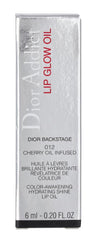 Dior Addict Lip Glow Oil Rosewood 012 swatch demonstrates protective, hydrating film on lips.