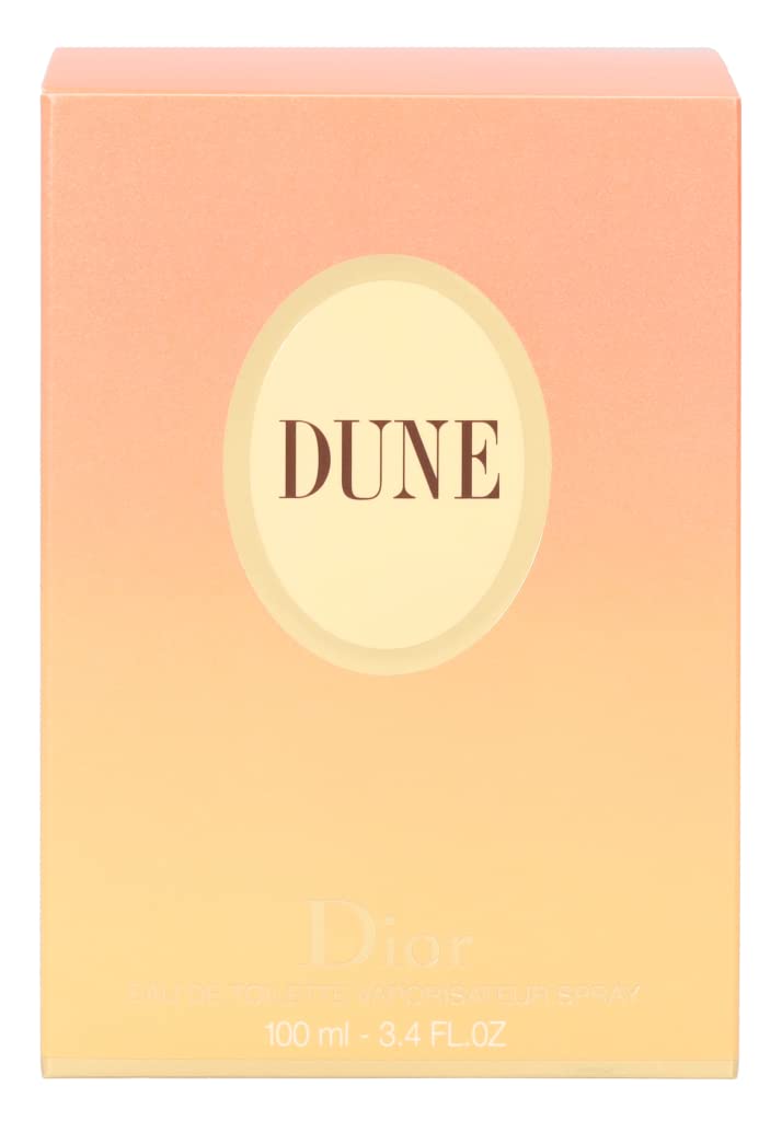 Dior Dune on a beach backdrop evoking vacation mood and escape.