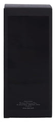 Dior Fahrenheit cap close-up under dramatic lighting suggests premium quality and long-lasting fragrance.