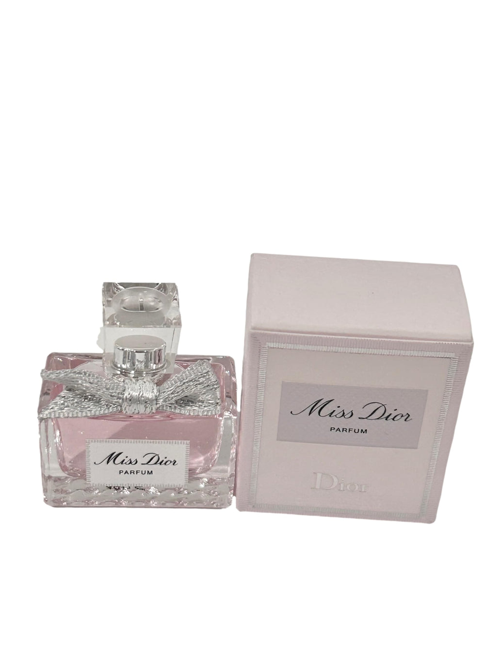 Dior Mini Parfum dabber applicator allows precise splash application.