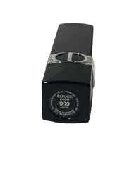 Dior Rouge Lipstick 999 Matte worn on lips delivers velvety, even color.