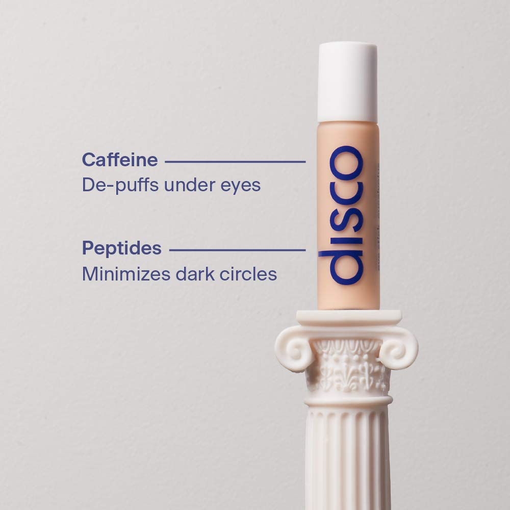 Disco Men's Eye Bag Treatment bottle close-up: premium packaging