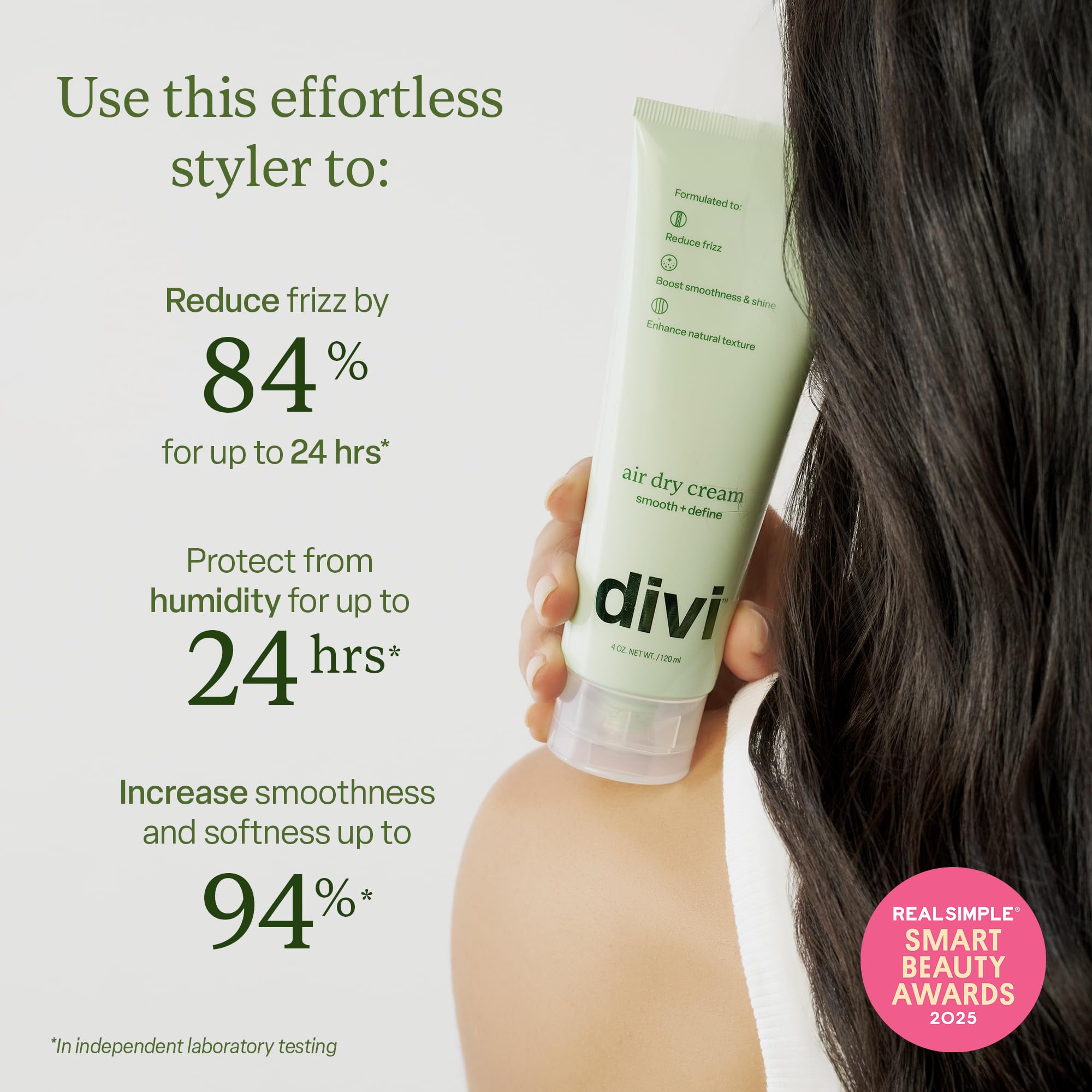 Divi Air Dry Styling Cream application on hair demonstrates even distribution for smoothness.