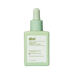 Divi Scalp Serum bottle dispensing for precise scalp application and nourishment.