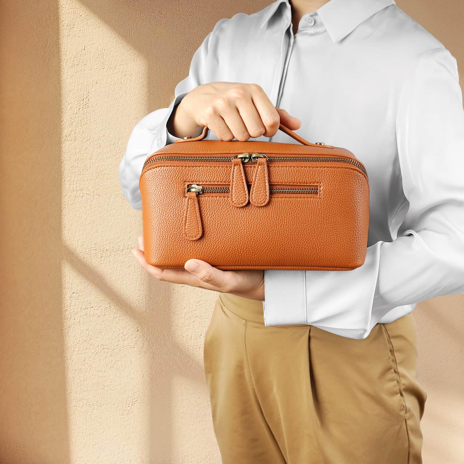 Divvia bag with detachable dividers keeps cosmetics neatly separated.