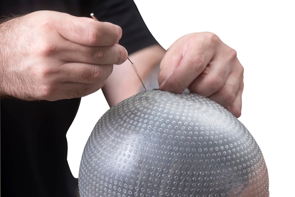 Dompel Sparta 2.4K cap shown in a professional salon setting.