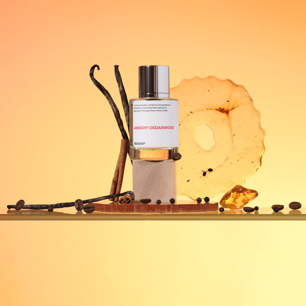 Dossier Ambery Cedarwood liquid swatch reveals amber-cedarwood warmth suitable for evening wear.