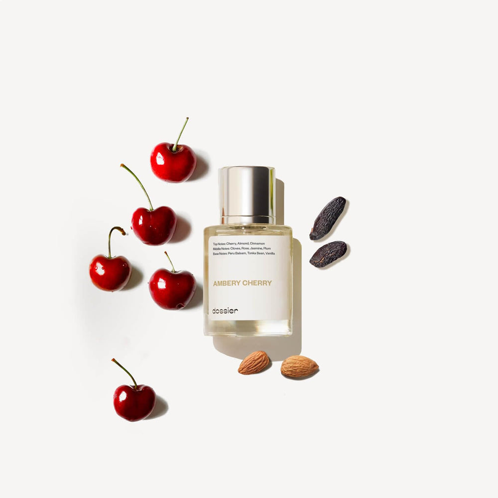 Dossier Ambery Cherry holding bottle for quick fragrance check