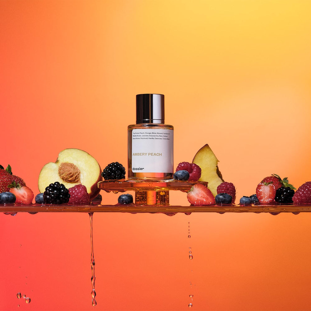 Dossier Ambery Peach metallic cap close-up highlights premium packaging.