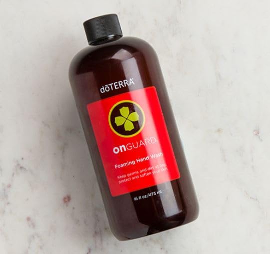 doTERRA On Guard foaming hand wash label closeup emphasizes essential oil blend