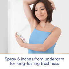 Dove aluminum-free deodorant spray being applied six inches from the underarm for freshness.