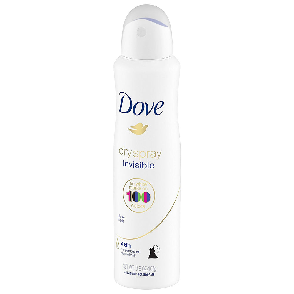 Dove Dry Spray Invisible Sheer Fresh compact can held in hand for travel.