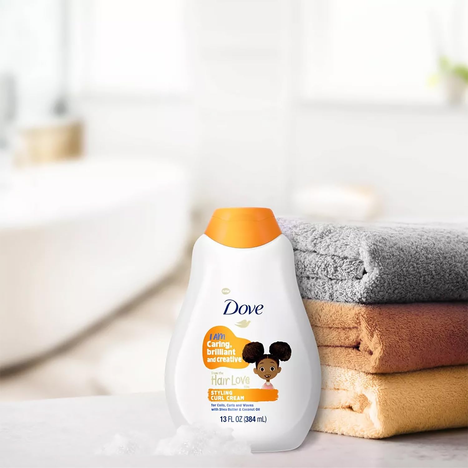 Dove Hair Love Zuri illustration on packaging highlighting empowerment for curls
