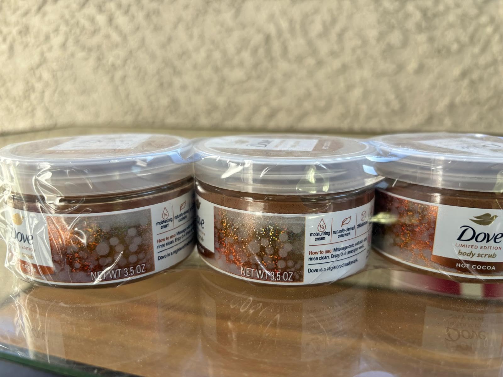 Dove Hot Cocoa Body Scrub pack on display highlights value and limited edition scent.