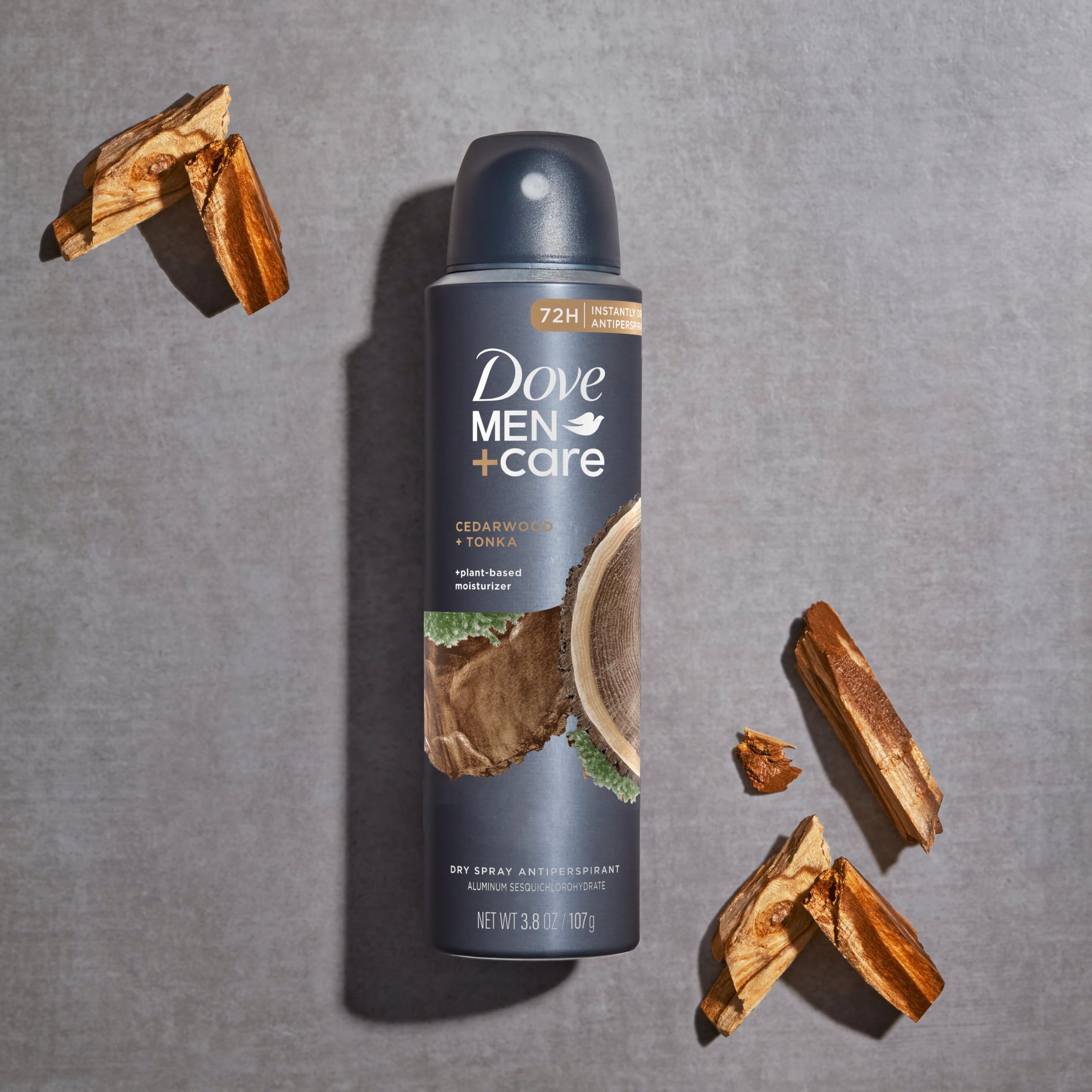 Dove Men+Care Cedarwood Tonka dry spray being applied during an active day.