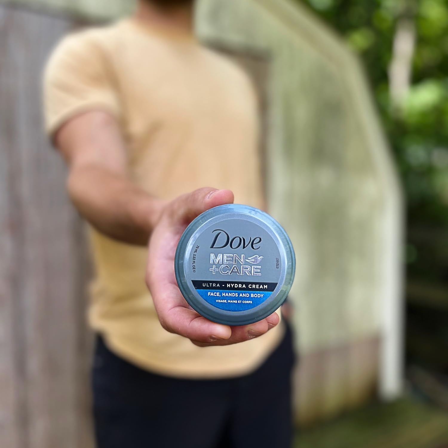 Back view of Dove Men+Care Ultra Hydra Cream Lotion showing 3-in-1 care for face, hands, and body