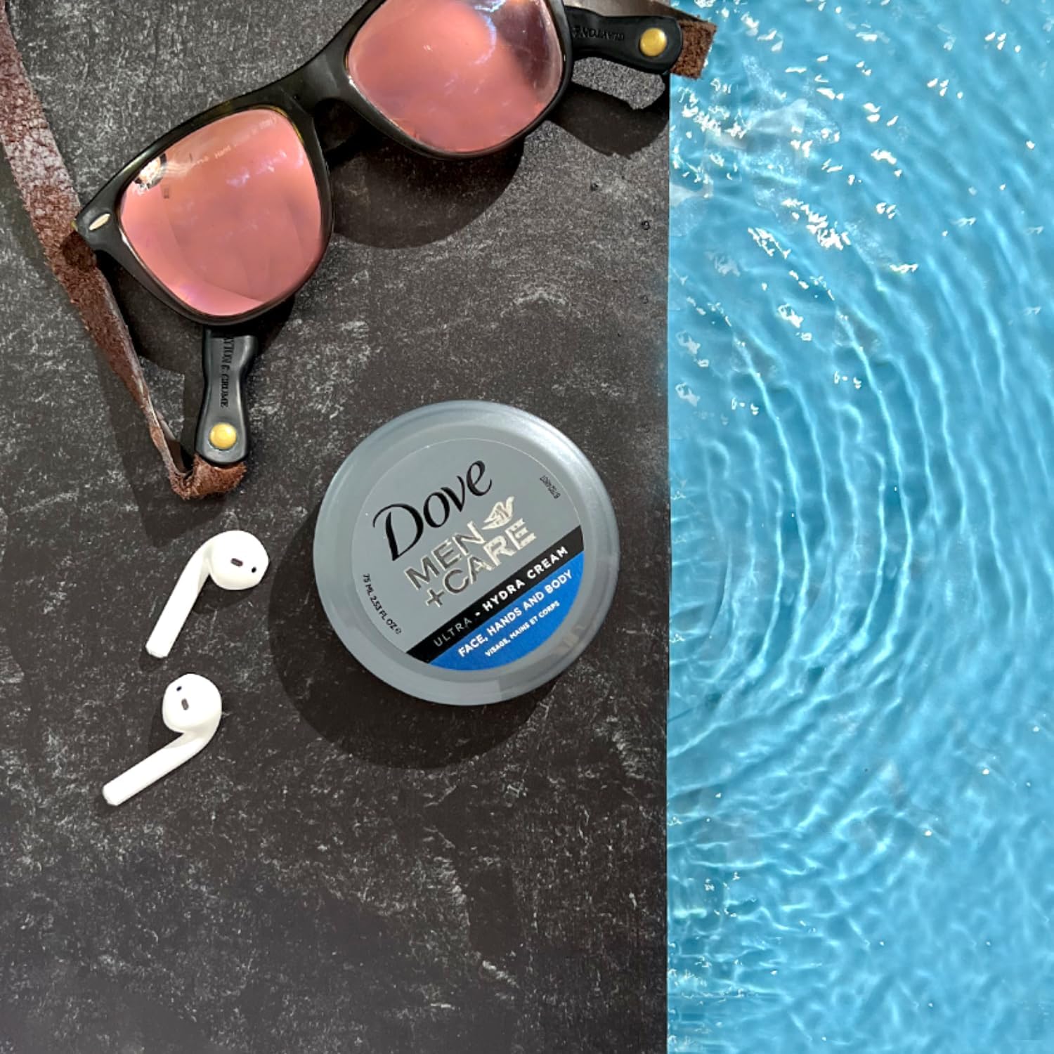 Hand-application with Dove Men+Care Ultra Hydra Cream Lotion delivering instant moisture