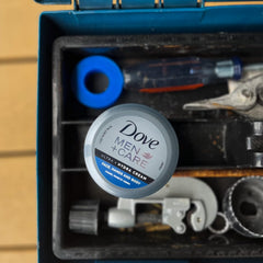 Label closeup of Dove Men+Care Ultra Hydra Cream Lotion confirms cruelty-free, PETA-approved skincare