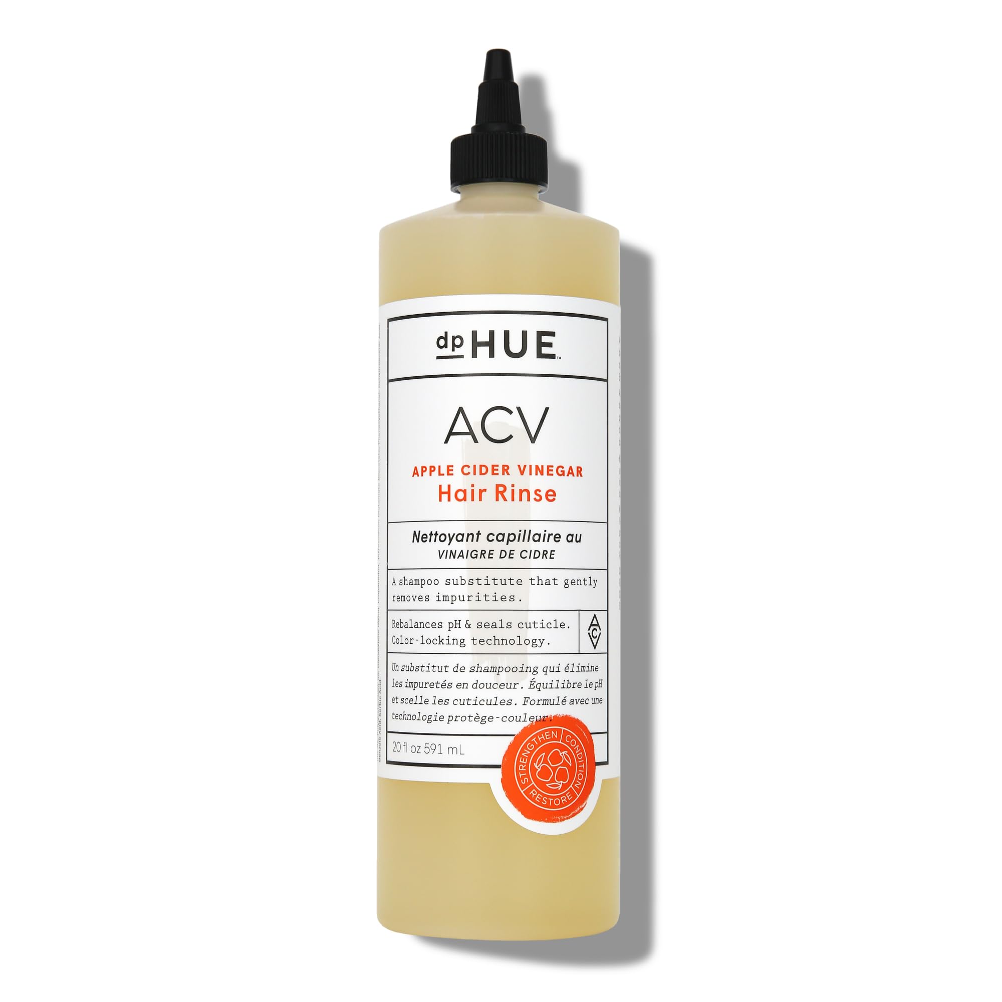 dpHUE Apple Cider Vinegar Hair Rinse bottle pour shows clean, non-stripping refresh.
