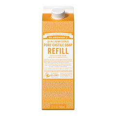 Dr. Bronner's liquid soap refill carton pouring reduces plastic waste.