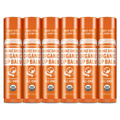 Dr. Bronner’s Organic Lip Balm Orange Ginger application on lips delivers lasting moisture.
