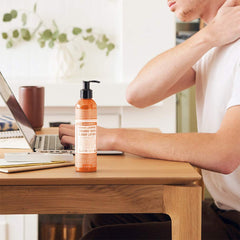 Dr. Bronner's Organic Lotion Orange Lavender cream on skin shows rich emollience
