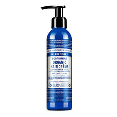 Dr. Bronner's Organic Hair Crème peppermint bottle highlights organic oils for shine and manageability.