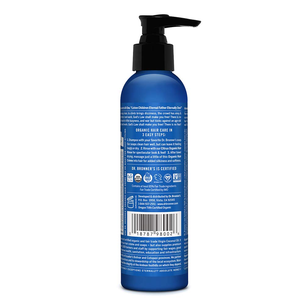Dr. Bronner's Organic Hair Crème peppermint in hands for smooth, lightweight styling.