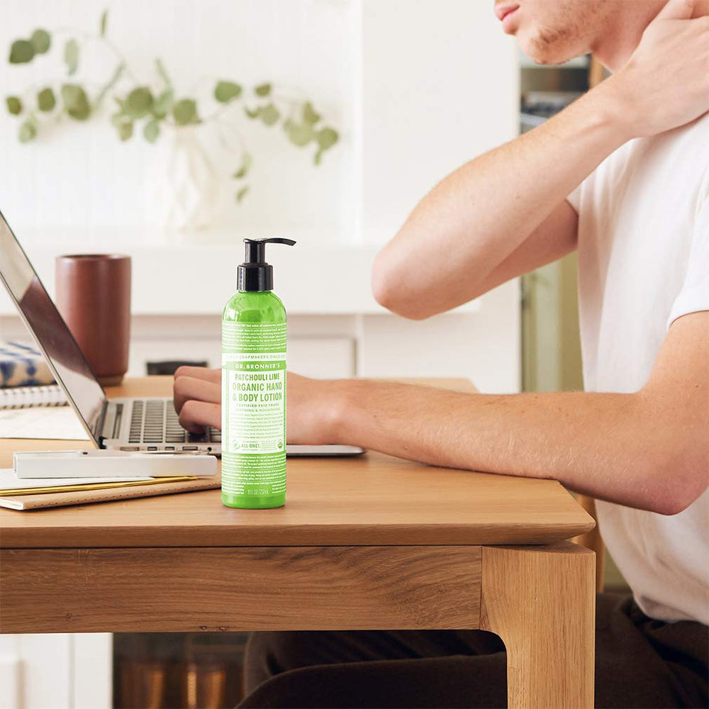 Dr. Bronner's Lotion being rubbed into hands for quick absorption and softness.