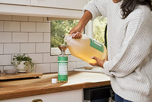 Dr. Bronner's organic-oils-fair-trade bottle supports ethical cleansing with plant-based ingredients.