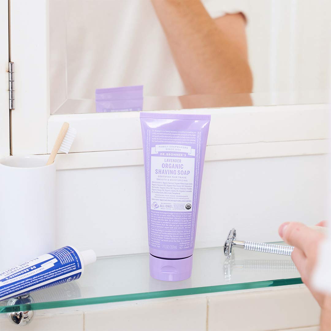 Dr. Bronner's Baby Unscented Shaving Soap bottle pour for sensitive skin.