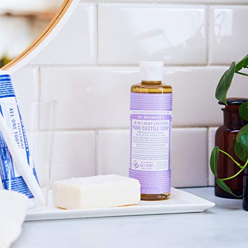 Dr. Bronner's lavender-dilution setup demonstrates multi-use for dishwashing and brush cleaning.