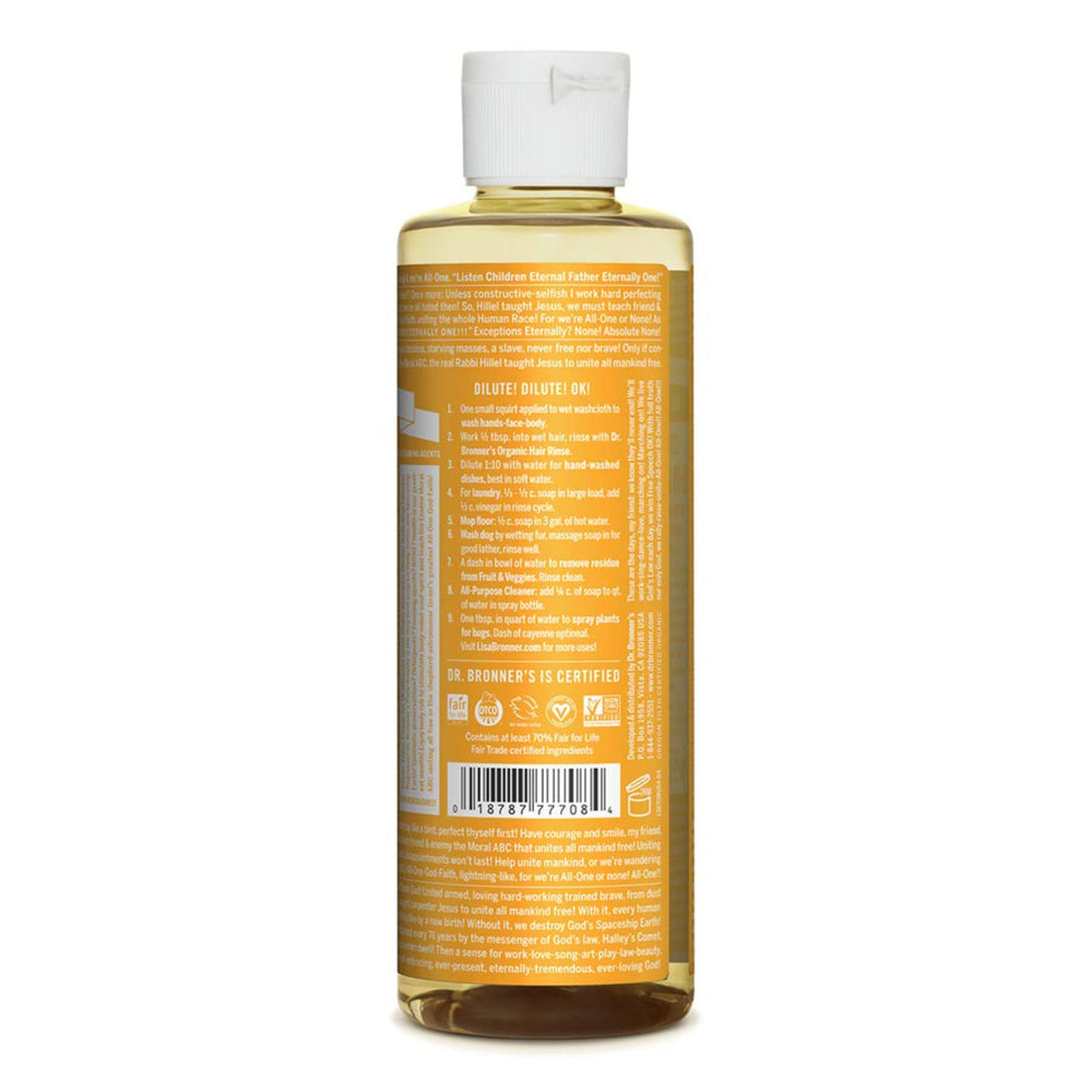 Dr. Bronner's Citrus soap producing light foam for surface cleaning and gentle lather.