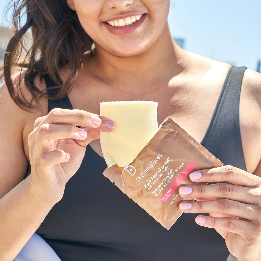 Dr Dennis Gross Alpha Beta Glow Pad on cheek shows natural-looking color development