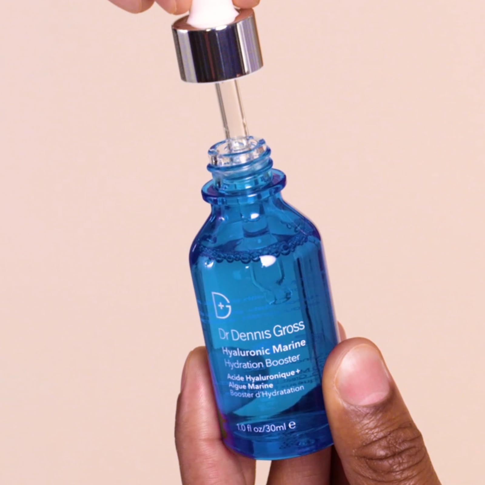 Dr Dennis Gross Hyaluronic Marine Hydration Booster dispenser shows quick, even application for thirsty skin