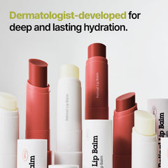 Dr.Different retinal lip balm packaging flatlay highlights sleek Korean skincare design.