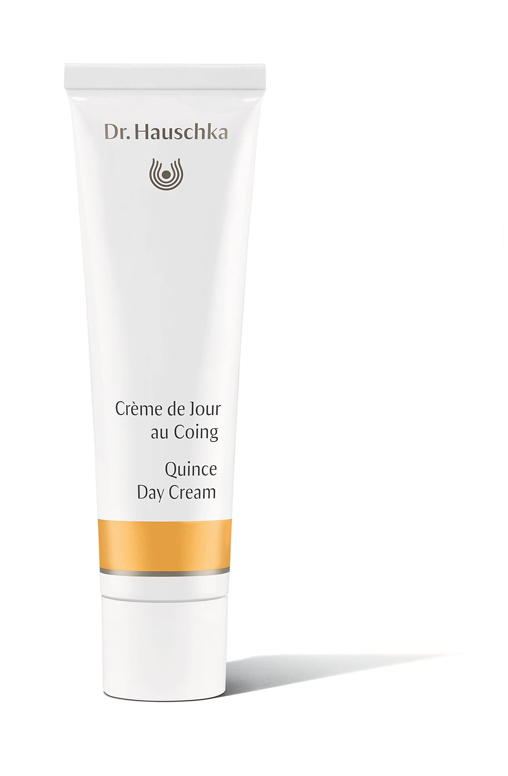 Dr. Hauschka Quince Day Cream tube close-up showing lightweight hydration for normal to slightly dry skin.