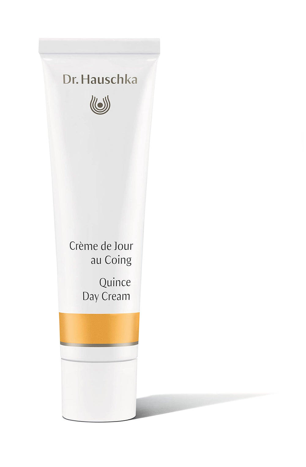 Dr. Hauschka Quince Day Cream tube close-up showing lightweight hydration for normal to slightly dry skin.