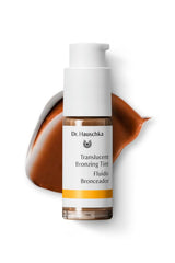 Dr. Hauschka Translucent Bronzing Tint application on cheek for radiant, natural warmth