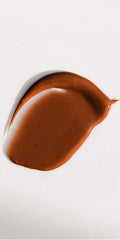 Dr. Hauschka Bronzing Tint packaging shot highlighting compact, travel-friendly formula