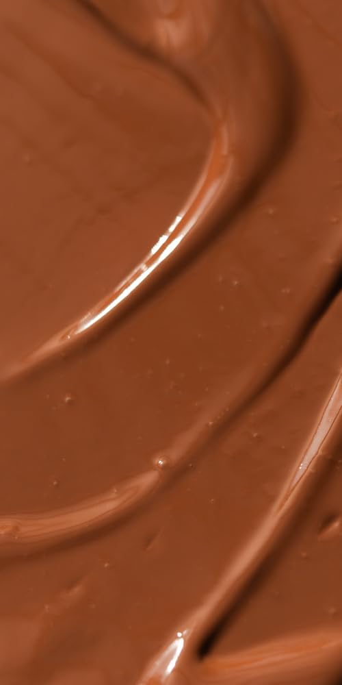 Dr. Hauschka Translucent Bronzing Tint swirled on skin for sunlit glow