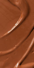 Dr. Hauschka Translucent Bronzing Tint swirled on skin for sunlit glow